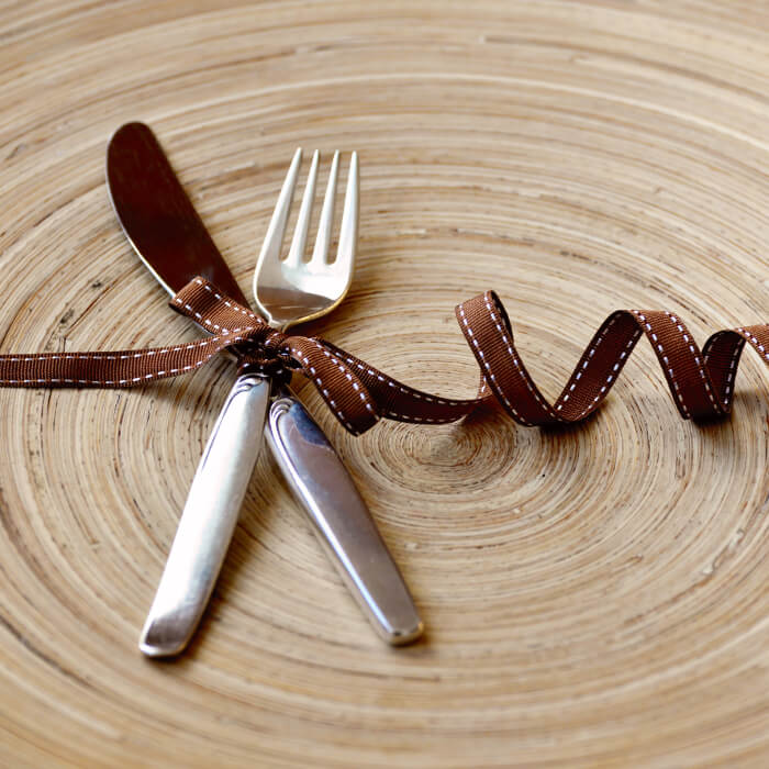 Cutlery ties with a rustic ribbon