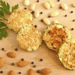 Almond breaded zucchini rounds on a plate