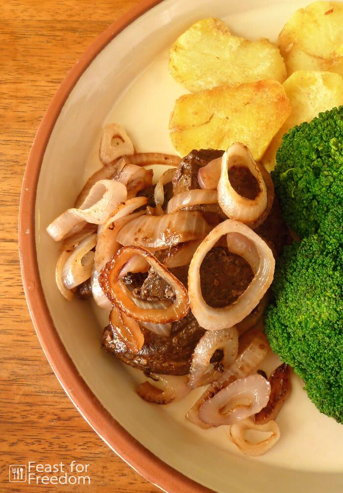 Beef liver and onions with pan fried potatoes and broccoli
